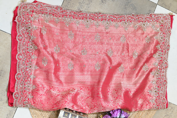 Coral pink jacquard silk saree with sequin and bead embroidery and scalloped border