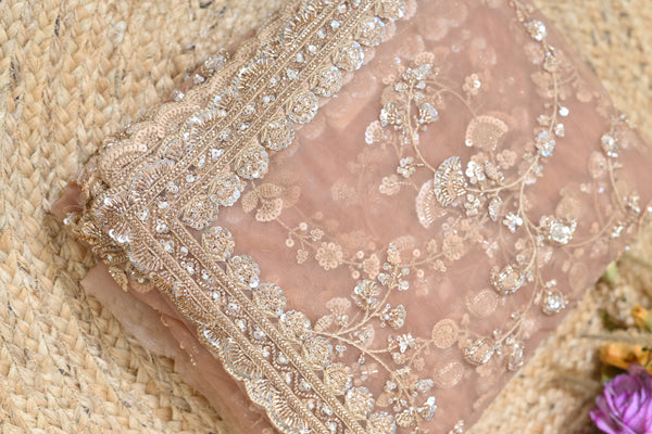 Dusty rose net saree - close up of scalloped border with sequin and bead embroidery