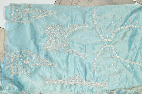 Sky blue net saree with floral bead and sequin embroidery